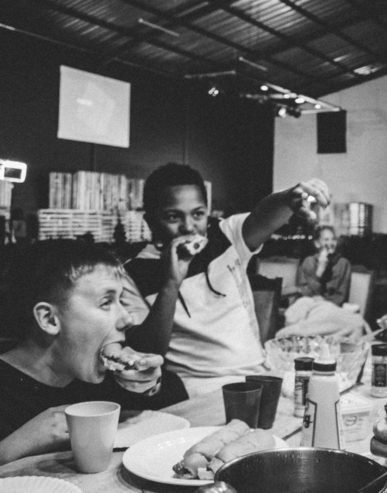 Kids eating and having fun together