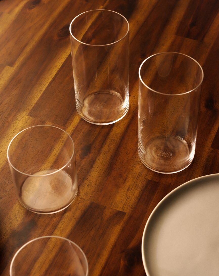 Tall and short glassware on table #defaulttitle